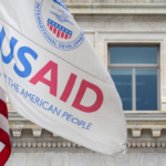 The USAID flag flies outside the agency's headquarters building in Washington, DC, on January 30, 2024