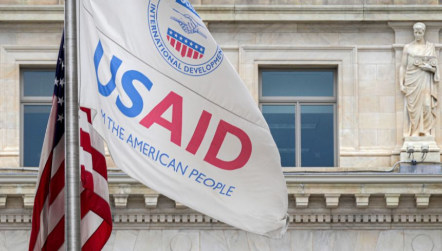 The USAID flag flies outside the agency's headquarters building in Washington, DC, on January 30, 2024