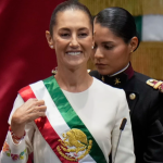 President Claudia Sheinbaum wears the presidential sash during her swearing-in ceremony as Mexico's new president in Mexico City, October 1 2024 Eduardo Verdugo/AP
