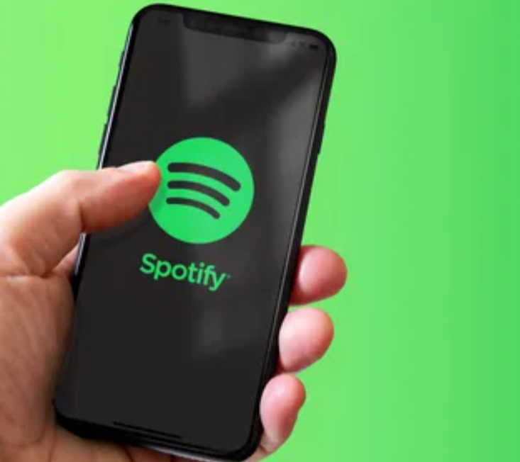Spotify logo Smartphone displaying the Spotify logo. Spotify is an audio streaming service that offers users access to multiple forms of streaming media, including music, podcasts, and audiobooks