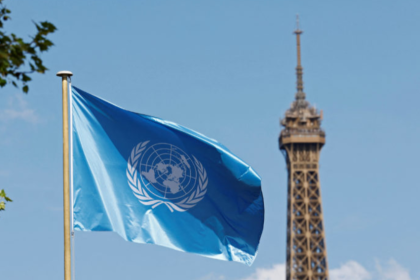 The flag of UNESCO flies at the UNESCO headquarters, with the Eiffel Tower in the background, in Paris, France, April 17, 2025. File photo by Abdul Saboor/Reuters