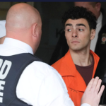 Luigi Nicholas Mangione walks at Blair County Courthouse in Hollidaysburg, Pennsylvania U.S., Thursday, Dec. 19, 2024. Gene J. Puskar/Pool via REUTERS