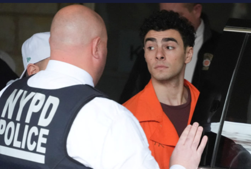 Luigi Nicholas Mangione walks at Blair County Courthouse in Hollidaysburg, Pennsylvania U.S., Thursday, Dec. 19, 2024. Gene J. Puskar/Pool via REUTERS